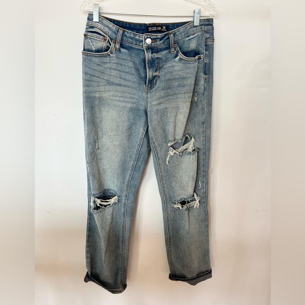 Relaxed fit mid rise straight leg distressed jeans